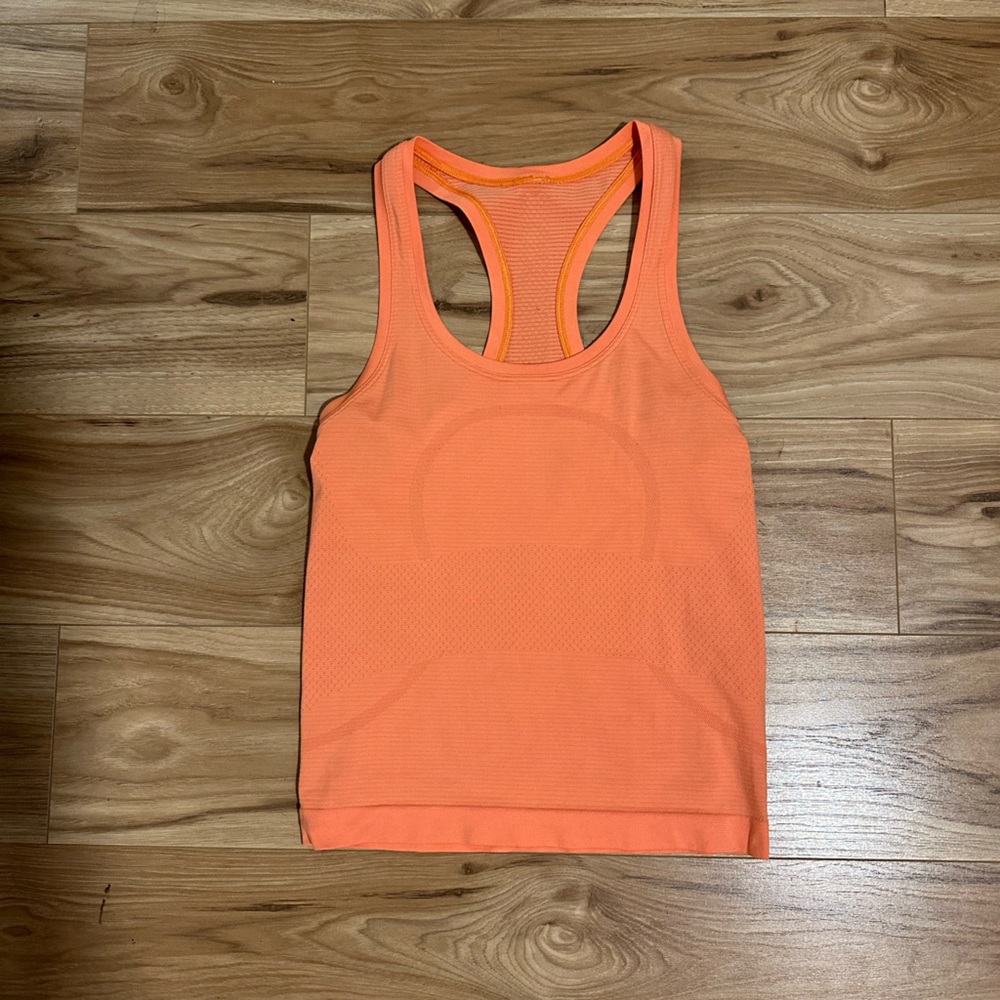 Lululemon swiftly tech racer back tank top size 2 (orange soda)